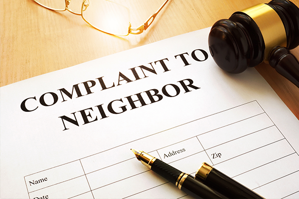 An image showing a court order showing a neighbors complaint